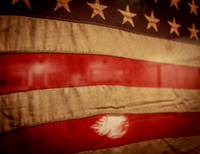 Gun Fire Hits American Flag
